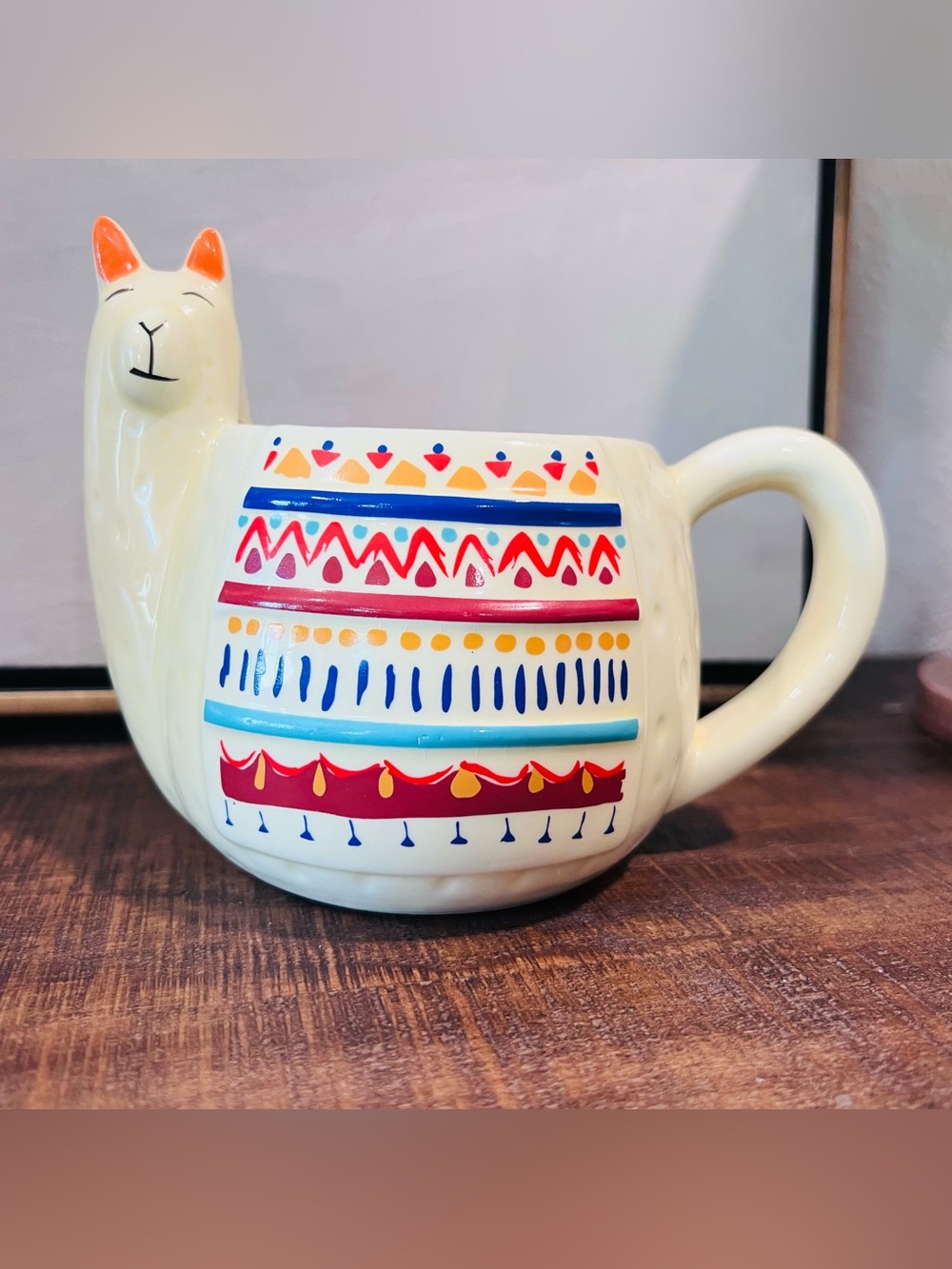 Whimsical Cream Llama Ceramic Mug with Multicolor Tribal Motif